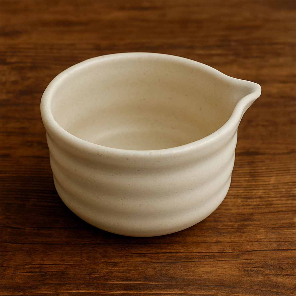 White ceramic bowl on a wooden surface