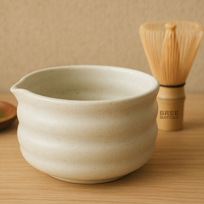 Ceramic matcha bowl with bamboo whisk